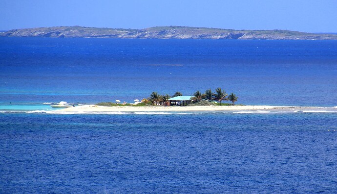 Sandy island et en fond Prickley Pear Cay ... Dog island